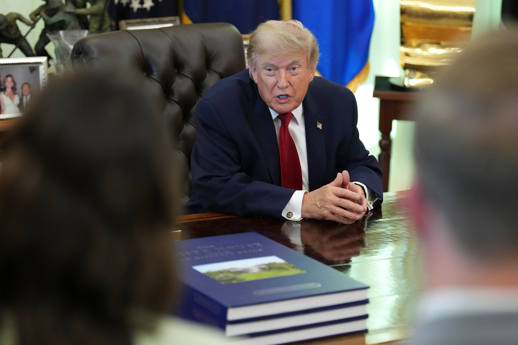 President Donald Trump speaks with reporters in the Oval Office of the White House, Monday, June 29, 2026, in Washington. (AP Photo/Jacquelyn Martin)