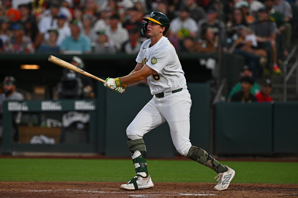 Athletics' Nick Kurtz (16) watches the flight of his three-run home run in the fifth innning of a baseball game against the San Francisco Giants in West Sacramento, Calif., Friday, May 15, 2026. (Jose Carlos Fajardo/Bay Area News Group via AP)