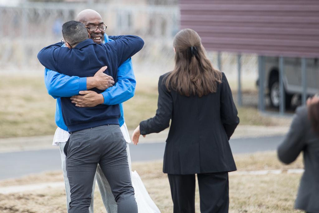 George Calicut Jr. meets his legal team at a prison in Coldwater, Mich., on March 3, 2026, after a judge threw out his 1999 murder conviction and life prison sentence. (Dustin Johnston/University of Michigan Law School via AP)