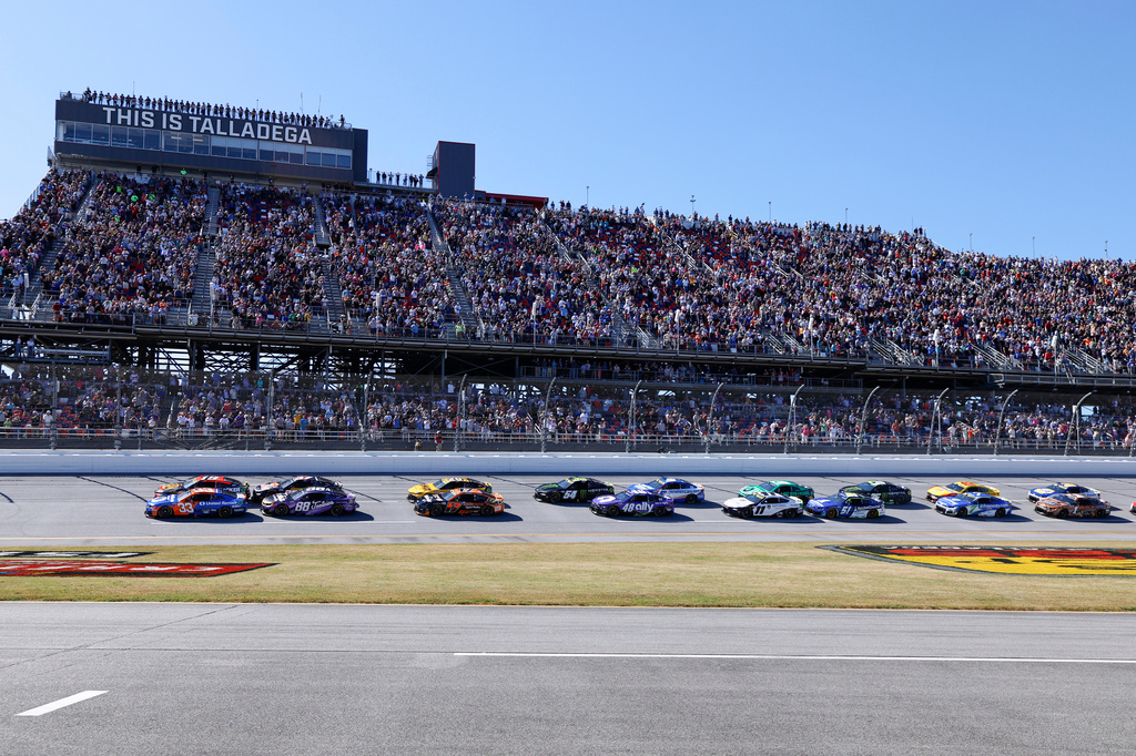 Chase Briscoe (19) leads the pack to the start of a NASCAR Cup Series auto race, Sunday, Oct. 25, 2026, in Talladega, Ala. (AP Photo/Butch Dill)