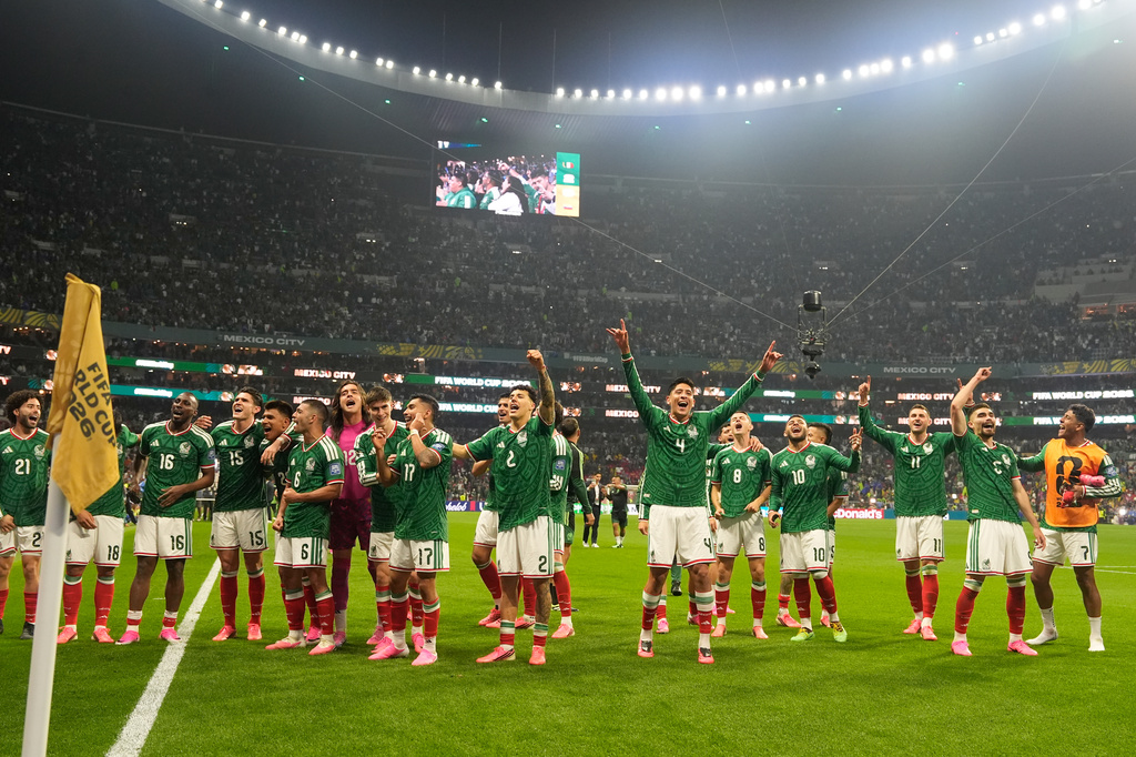 Mexico players celebrate after the World Cup round of 32 soccer match between Mexico and Ecuador in Mexico City, Tuesday, June 30, 2026. (AP Photo/Fernando Llano)