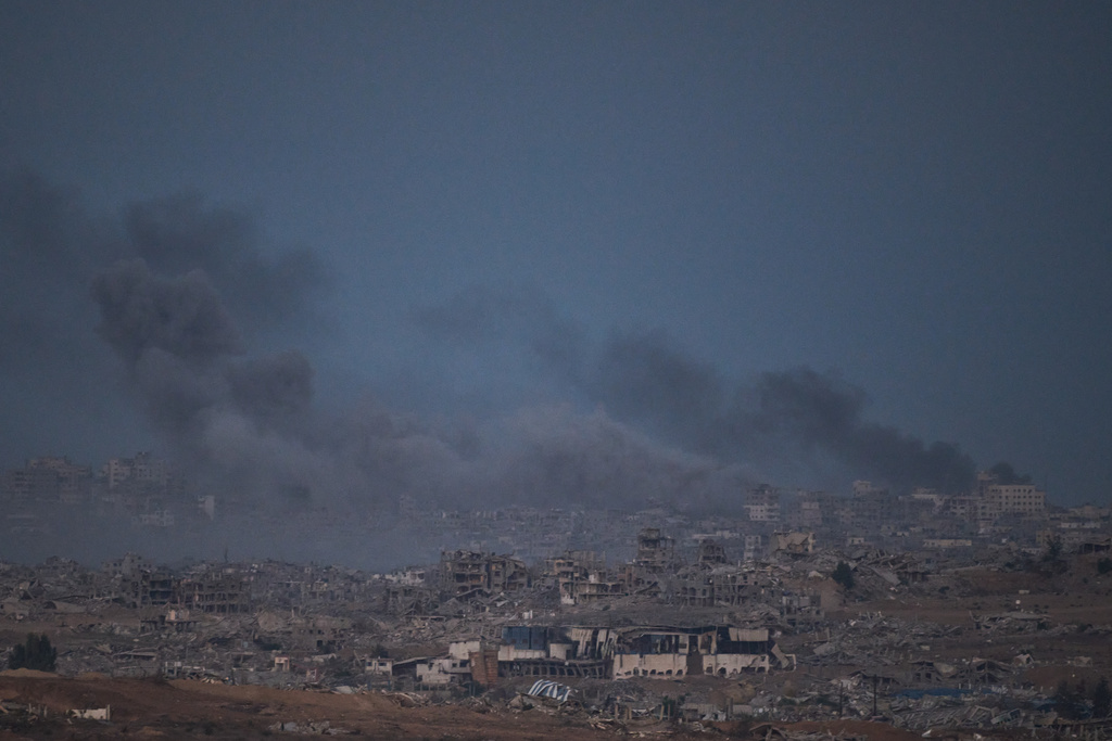 Smoke rises to the sky following an Israeli military strike in the northern Gaza Strip, as seen from southern Israel, Monday, Oct. 6, 2025. (AP Photo/Leo Correa)