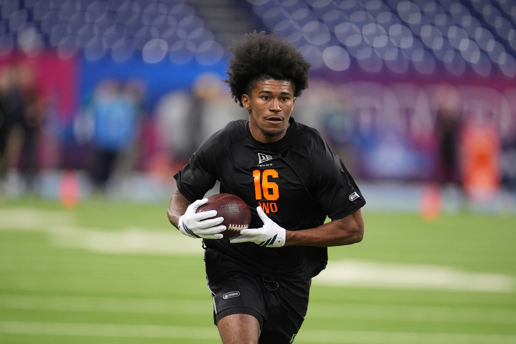 FILE - Texas A&M wide receiver KC Concepcion (16) runs a drill at the NFL football scouting combine in Indianapolis, Saturday, Feb. 28, 2026. (AP Photo/Michael Conroy, File)