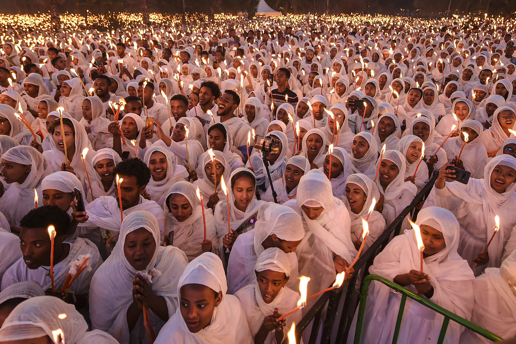 Ethiopian pilgrims pray during a Mass service for Ethiopian Christmas at the Bole Medhane Alem church in Addis Ababa, Ethiopia, Monday, Jan. 6, 2025. (AP Photo)
