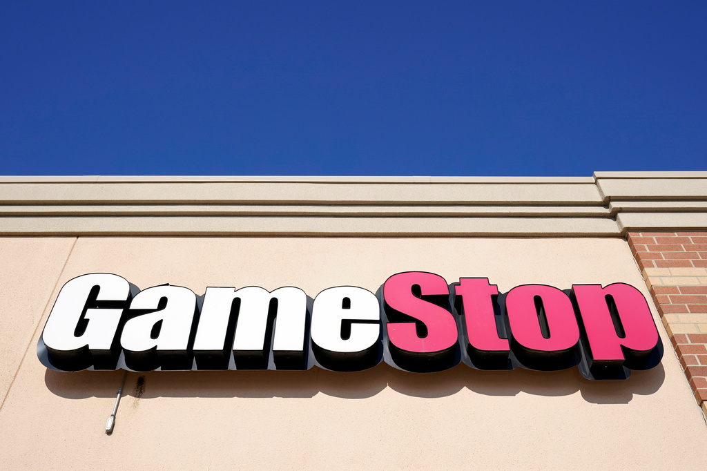 FILE - A GameStop sign is displayed above a store in Urbandale, Iowa, on Jan. 28, 2021. (AP Photo/Charlie Neibergall, File)