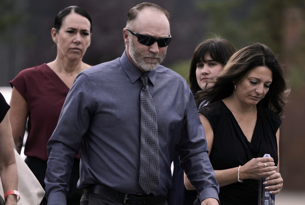 Tyler Robinson’s parents, Matt Robinson and Amber Robinson, right, arrive at the Fourth District Courthouse, Tuesday, July 7, 2026, in Provo, Utah, ahead of a hearing for Tyler Robinson, who is accused in the fatal shooting of Charlie Kirk. (AP Photo/Spenser Heaps)