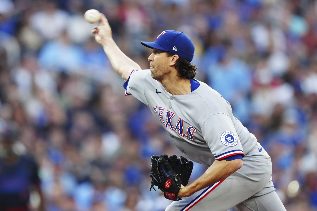Texas Rangers pitcher Jacob deGrom (48) works against the Toronto Blue Jays during first inning MLB baseball action in Toronto on Friday, August 15, 2025. (Frank Gunn/The Canadian Press via AP)