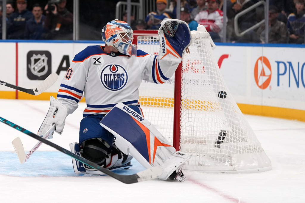 Edmonton Oilers goaltender Calvin Pickard watches as a shot by St. Louis Blues' Dalibor Dvorsky scores during the second period of an NHL hockey game Monday, Nov. 3, 2025, in St. Louis. (AP Photo/Jeff Roberson)