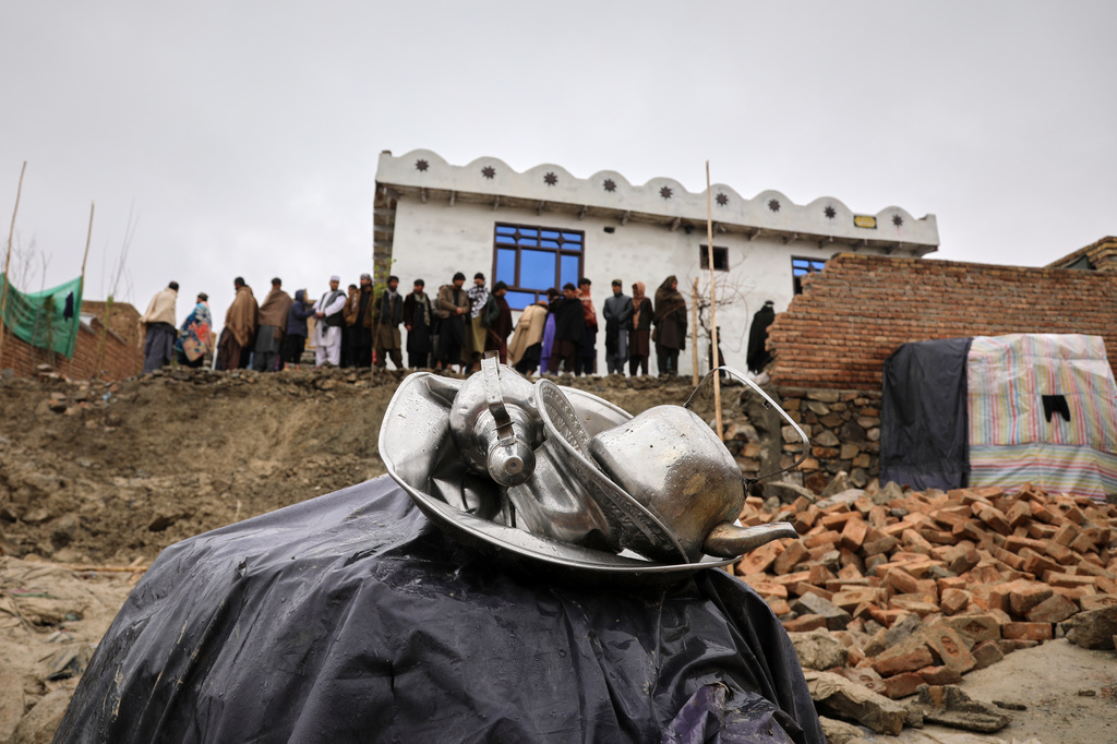 Items are seen piled up at a house damaged by an earthquake in the village of Ittefaq, on the outskirts of Kabul, Afghanistan, Saturday, April 4, 2026. (AP Photo/Siddiqullah Alizai)