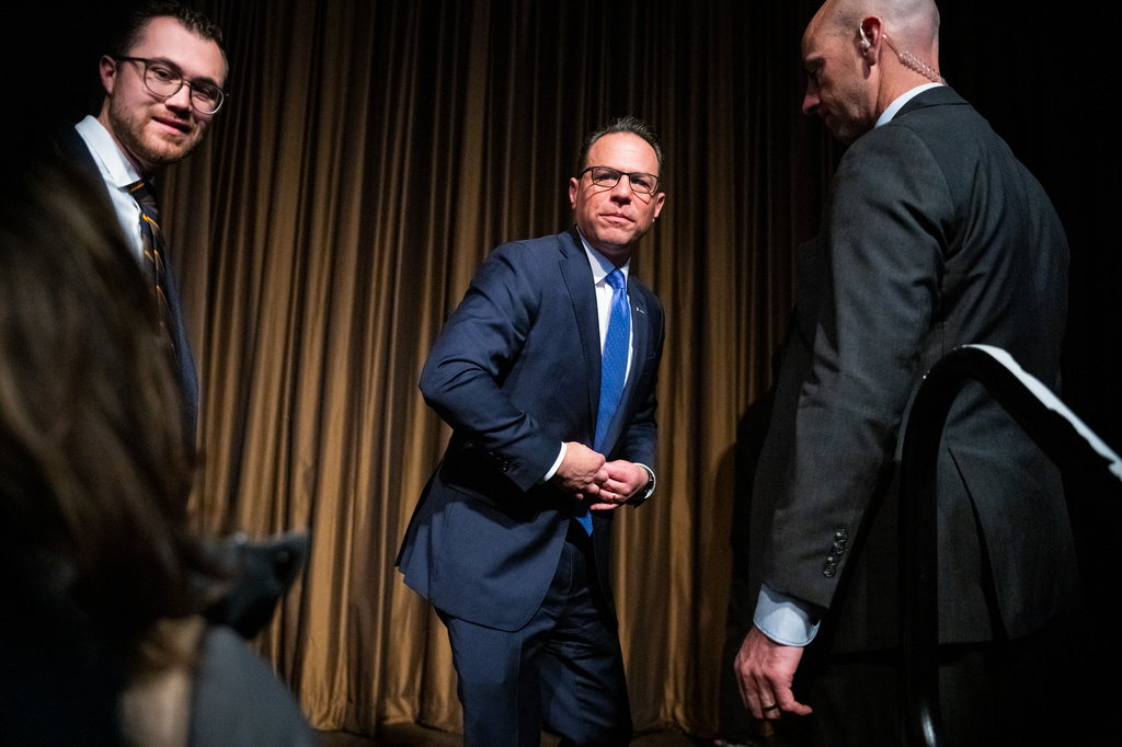 Josh Shapiro, Governor of Pennsylvania, exits the stage of the National Action Network (NAN) Convention in New York, Wednesday, April 8, 2026. (AP Photo/Angelina Katsanis)