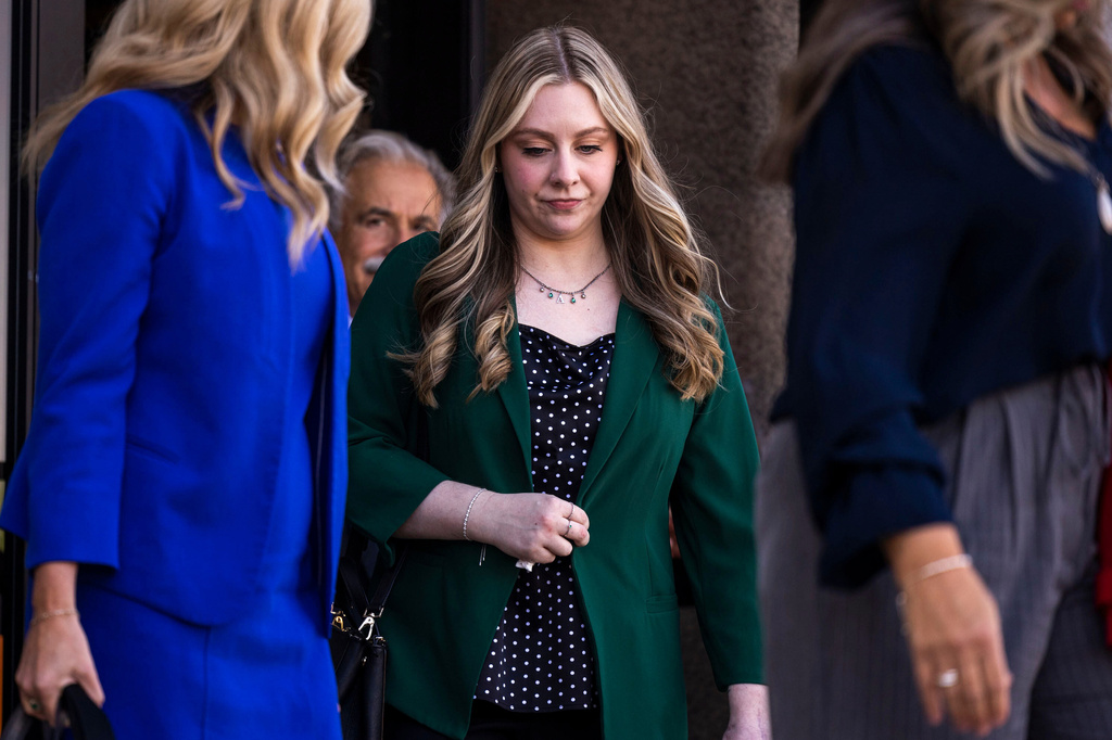 FILE - Abby Zwerner exits the courthouse after a verdict was reached in her lawsuit against the assistant principal, Ebony Parker, of Richneck Elementary School during proceedings at Newport News Circuit Court on Nov. 6, 2025. (Kendall Warner/The Virginian-Pilot via AP, File)