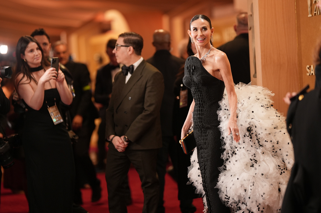 Demi Moore arrives at the 32nd Annual Actor Awards on Sunday, March 1, 2026, at the Shrine Auditorium and Expo Hall in Los Angeles. (Photo by Richard Shotwell/Invision/AP)