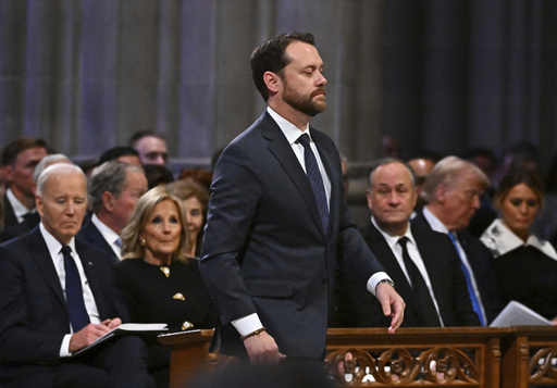 Jason Carter walks to speak during the state funeral for his grandfather former President Jimmy Carter at the National Cathedral, Thursday, Jan. 9, 2025, in Washington. Looking on from left are President Joe Biden, first lady Jill Biden, second gentleman Doug Emhoff, President-elect Donald Trump and his wife Melania Trump. (Ricky Carioti/The Washington Post via AP, Pool) Jason Carter walks to speak during the state funeral for his grandfather former President Jimmy Carter at the National Cathedral, Thursday, Jan. 9, 2025, in Washington. Looking on from left are President Joe Biden, first lady Jill Biden, second gentleman Doug Emhoff, President-elect Donald Trump and his wife Melania Trump. (Ricky Carioti/The Washington Post via AP, Pool)