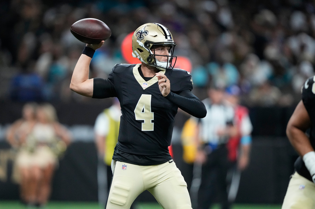 New Orleans Saints quarterback Zach Wilson throws during the first half of an NFL preseason football game against the Jacksonville Jaguars Saturday, Aug. 15, 2026, in New Orleans. (AP Photo/Gerald Herbert)