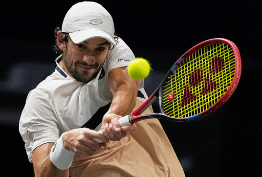 Vacherot of Monaco serves the ball to Cameron Norrie of Great Britain during their third round men's singles match at the Paris Masters tennis tournament at the Paris La Defense Arena, Thursday, Oct. 30, 2025, in Paris. (AP Photo/Michel Euler) Vacherot of Monaco serves the ball to Cameron Norrie of Great Britain during their third round men's singles match at the Paris Masters tennis tournament at the Paris La Defense Arena, Thursday, Oct. 30, 2025, in Paris. (AP Photo/Michel Euler)