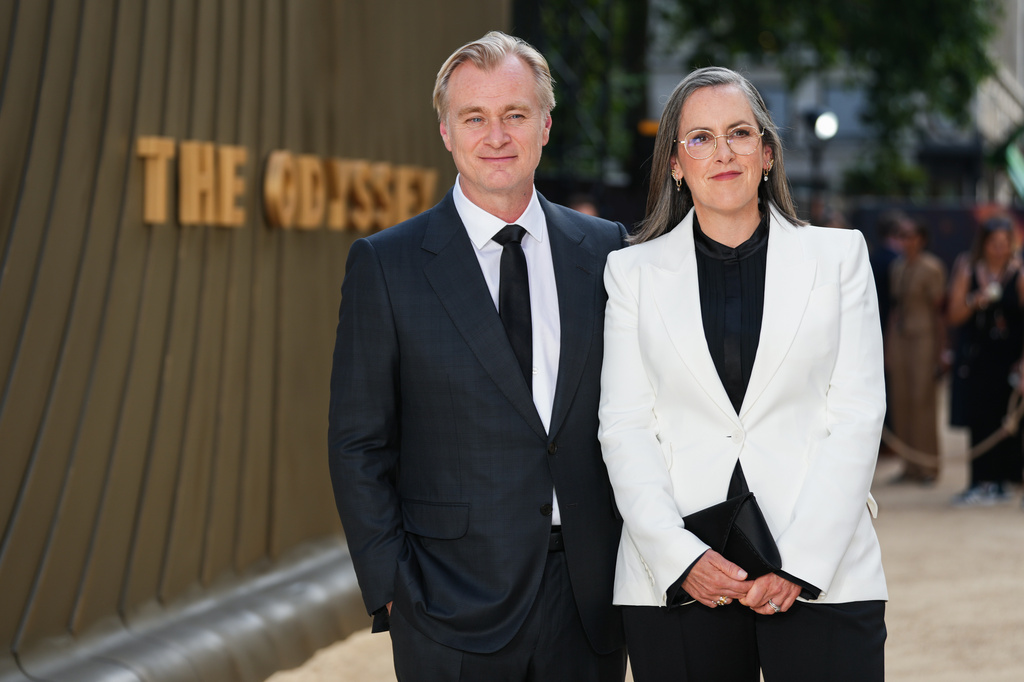 Director Christopher Nolan, left, and Emma Thomas pose for photographers upon arrival at the premiere of the film 'The Odyssey' on Monday, July 6, 2026, in London. (Photo by Scott A Garfitt/Invision/AP)