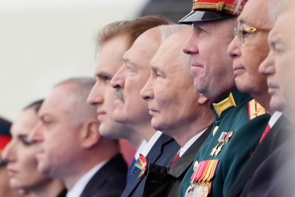 Russian President Vladimir Putin, fourth right, and foreign leaders attend the Victory Day military parade in Moscow, Saturday, May 9, 2026, during celebrations of the 81st anniversary of the Soviet Union's victory over Nazi Germany during the World War II. (AP Photo/Pavel Bednyakov, Pool)