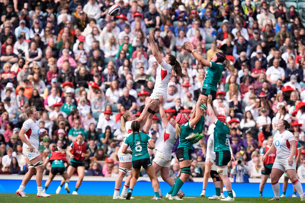England's Lilli Ives Campion, top left, wins a line-out during the Women's Six Nations Rugby 2026 match between England and Ireland, in London, Saturday, April 11, 2026. (Andrew Matthews/PA via AP)