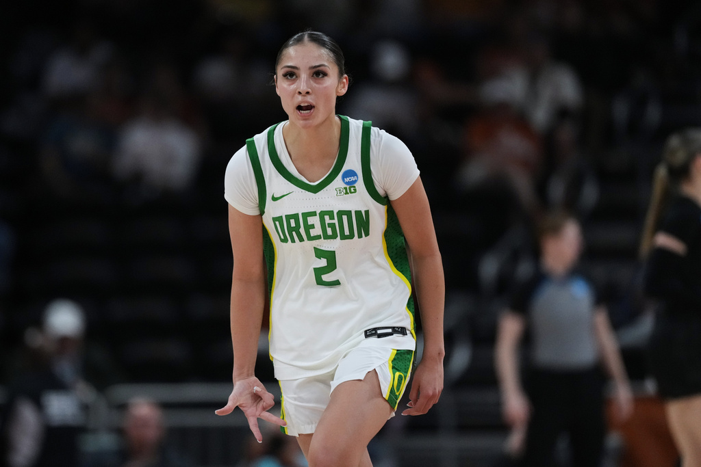 Oregon guard Katie Fiso (2) reacts to a score against Virginia Tech during the second half in the first round of the NCAA college basketball tournament, Friday, March 20, 2026. (AP Photo/Eric Gay)