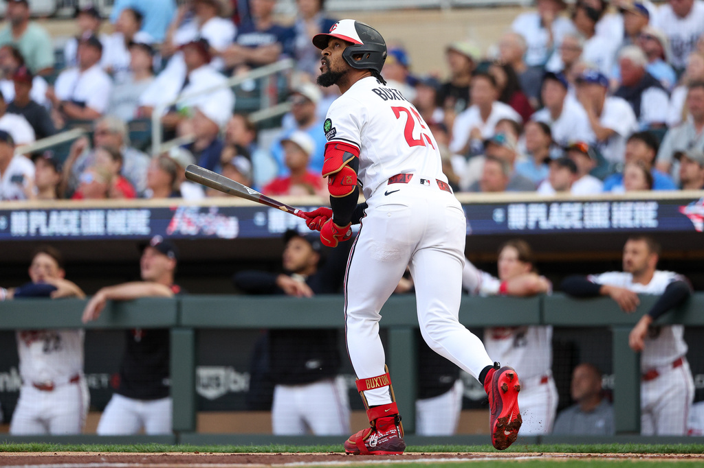 Minnesota Twins' Byron Buxton watches his solo home run against the Los Angeles Dodgers during the first inning of a baseball game, Monday, June 22, 2026, in Minneapolis. (AP Photo/Matt Krohn)