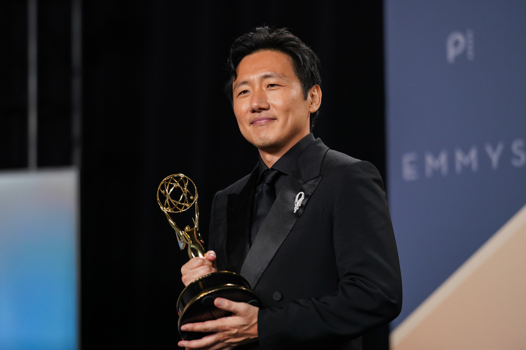 Hiro Murai poses in the press room with the award for outstanding directing for a comedy series for "Widow's Bay" during the 78th Emmy Awards on Monday, Sept. 14, 2026, at the JW Marriott in Los Angeles. (Photo by Richard Shotwell/Invision/AP)