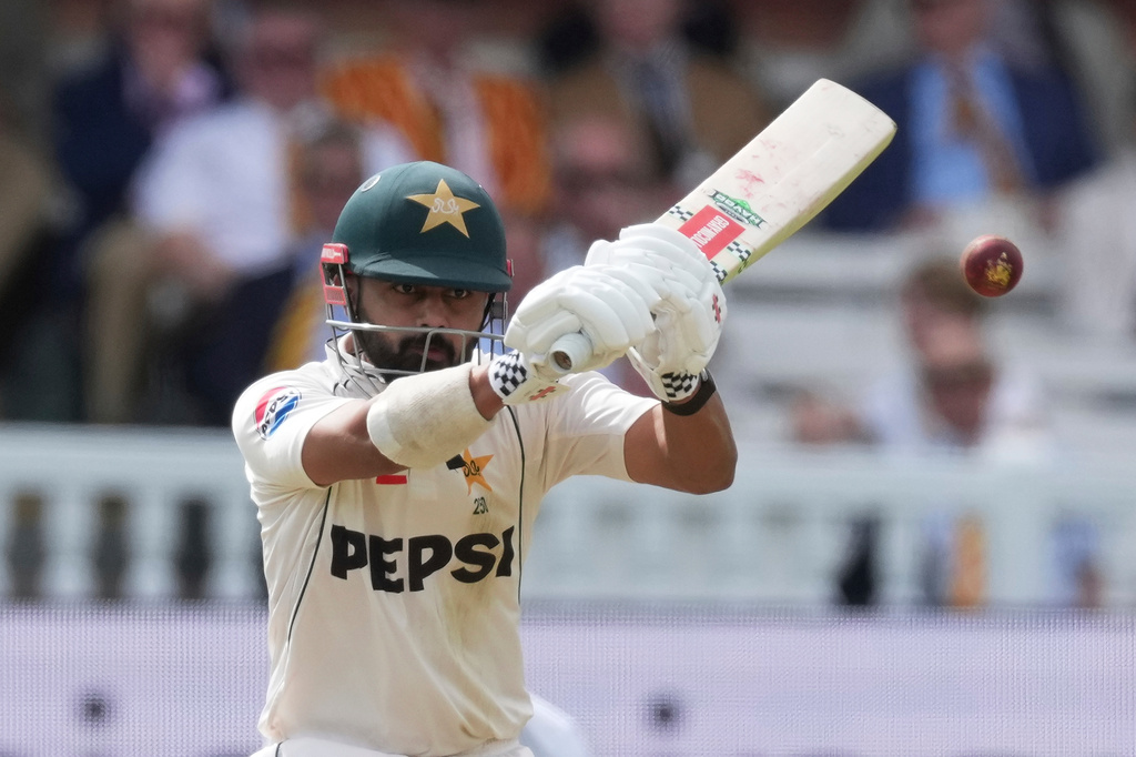 Pakistan's Saud Shakeel plays a shot on day four of the second cricket test match between England and Pakistan in London, Sunday, Aug. 30, 2026. (AP Photo/Dave Shopland)