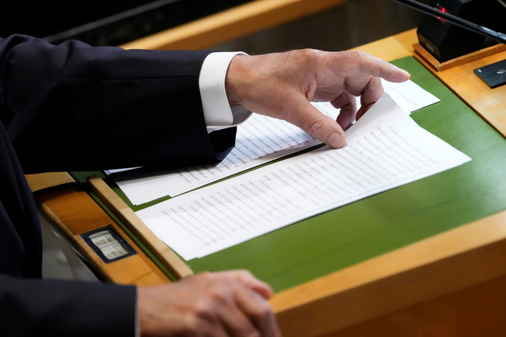 Russia's Minister of Foreign Affairs Sergey Lavrov flips through his speech as he addresses the 80th session of the United Nations General Assembly, Saturday, Sept. 27, 2025, at U.N. headquarters. (AP Photo/Pamela Smith)