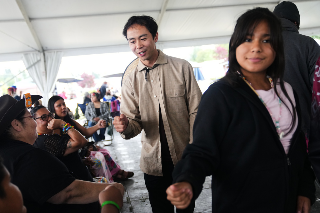 Yangbin Wu, center, greets the opposing team after his won in the first round during a Stick-Games Tournament hosted by the Puyallup Tribe in partnership with World Cup host city Seattle, Saturday, June 27, 2026, in Tacoma, Wash. (AP Photo/Lindsey Wasson)