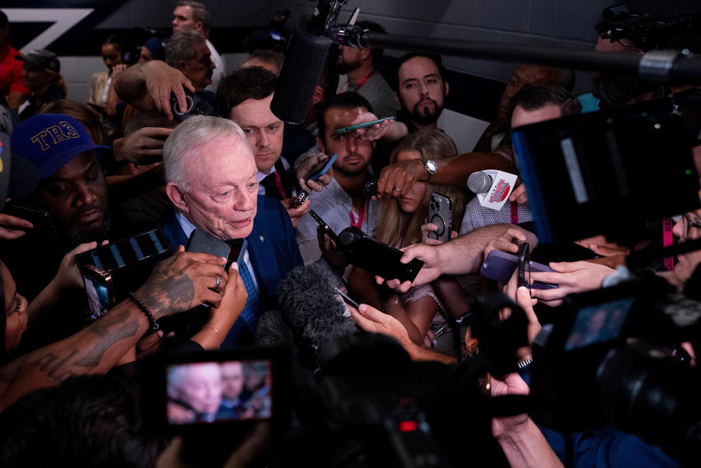 Dallas Cowboys owner Jerry Jones speaks to reporters following an NFL football game against the Green Bay Packers Sunday, Sept. 28, 2025, in Arlington, Texas. (AP Photo/Jeffrey McWhorter)