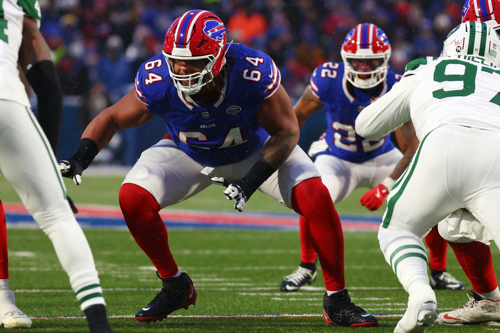 FILE - Buffalo Bills guard O'Cyrus Torrence (64) blocks during the first half of an NFL football game against the New York Jets in Orchard Park, N.Y., Sunday Jan. 4, 2026. (AP Photo/ Jeffrey T. Barnes, File)