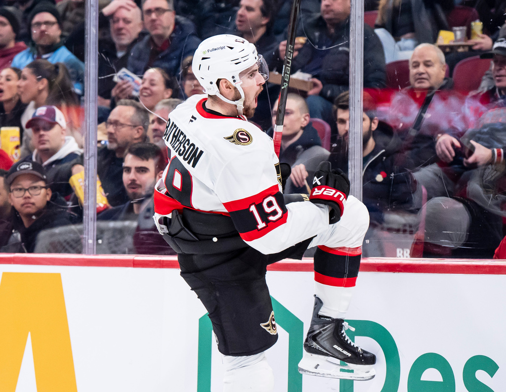 Ottawa Senators' Drake Batherson (19) celebrates his goal during second period NHL hockey action against the Montreal Canadiens in Montreal on Tuesday, Dec. 2, 2025. (Christopher Katsarov/The Canadian Press via AP)