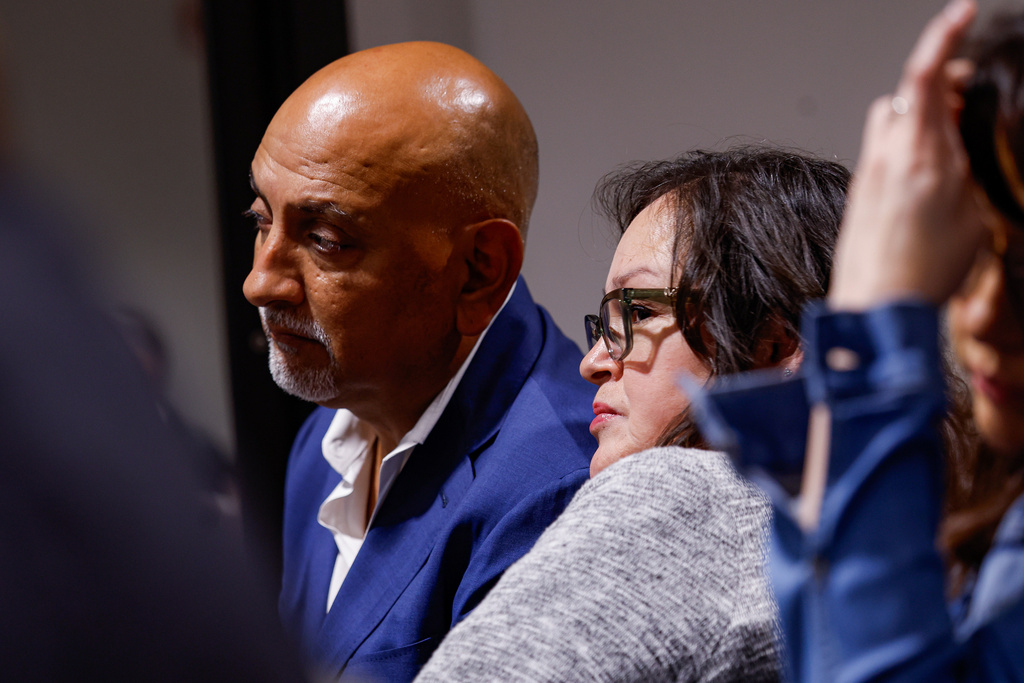 Jesse Rizo and his wife Juanita Cazares-Rizo listen to the prosecution and defense deliver their closing statements to the jury on the 11th day of the trial for former Uvalde school district police officer Adrian Gonzales at the Nueces County Courthouse on Wednesday, Jan. 21, 2026, in Corpus Christi, Texas. T (Sam Owens /The San Antonio Express-News via AP, Pool)