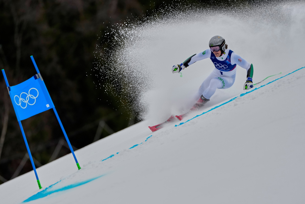 Brazil's Lucas Pinheiro Braathen speeds down the course, during an alpine ski, men's giant slalom race, at the 2026 Winter Olympics, in Bormio, Italy, Saturday, Feb. 14, 2026. (AP Photo/John Locher)