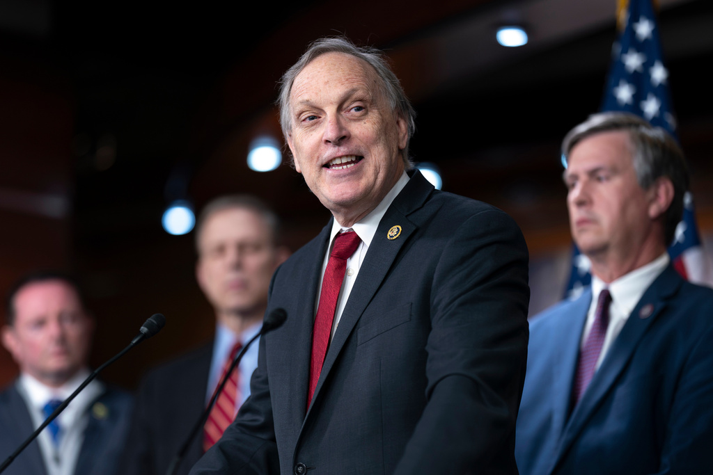 FILE - Rep. Andy Biggs, R-Ariz., speaks as members of the conservative House Freedom Caucus tell reporters about allegations that the government spies on Americans, during a news conference at the Capitol in Washington, Feb. 13, 2024. (AP Photo/J. Scott Applewhite, File)