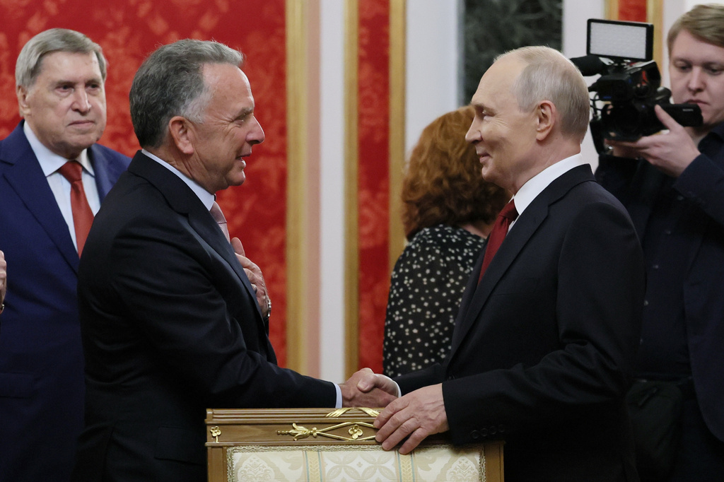 President Vladimir Putin, right, greets U.S. President Donald Trump's envoy Steve Witkoff, prior to talks at the Senate Palace of the Kremlin in Moscow, on Saturday, Sept. 5, 2026. (Mikhail Metzel/Sputnik/Kremlin Pool Photo via AP)