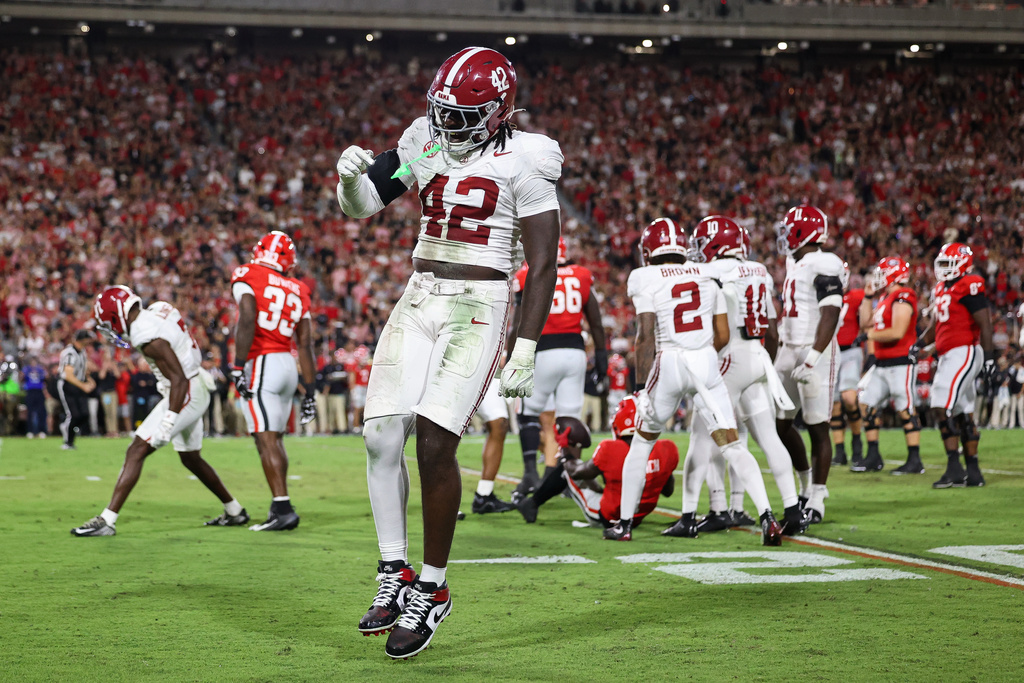 Alabama linebacker Yhonzae Pierre (42) reacts during the first half of an NCAA college football game against Georgia, Saturday, Sept. 27, 2025, in Athens, Ga. (AP Photo/Colin Hubbard)
