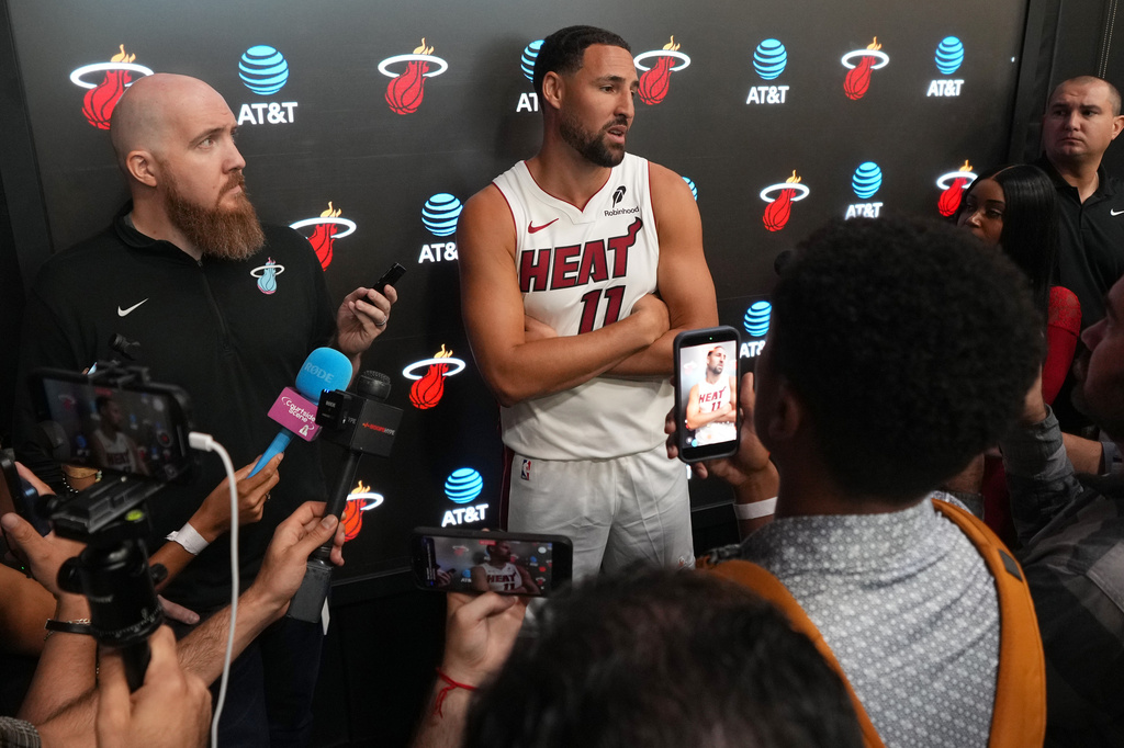 Miami Heat forward Klay Thompson (11) takes questions during the NBA basketball team's media day, Monday, Sept. 28, 2026, in Miami. (AP Photo/Jim Rassol)