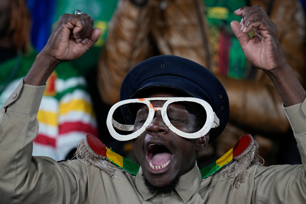 A Mali fan cheers before the Africa Cup of Nations best of 16 soccer match between Mali and Tunisia in Casablanca, Morocco, Saturday, Jan. 3, 2026. (AP Photo/Themba Hadebe)