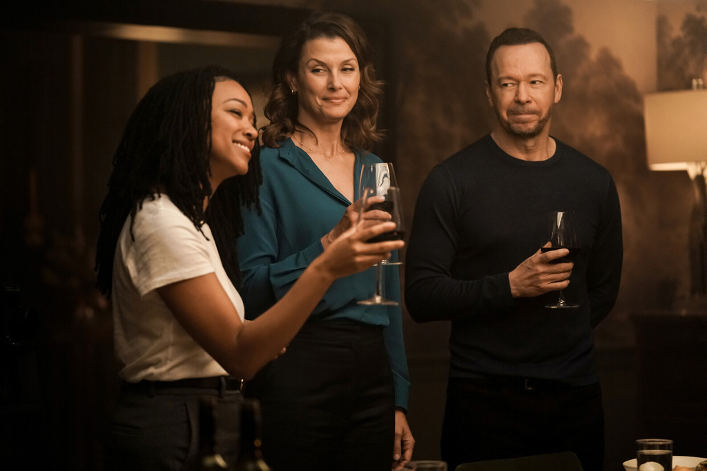 This image released by CBS shows, from left, Sonequa Martin-Green, Bridget Moynahan, and Donnie Wahlberg in a scene from "Boston Blue." (John Medland/CBS via AP)