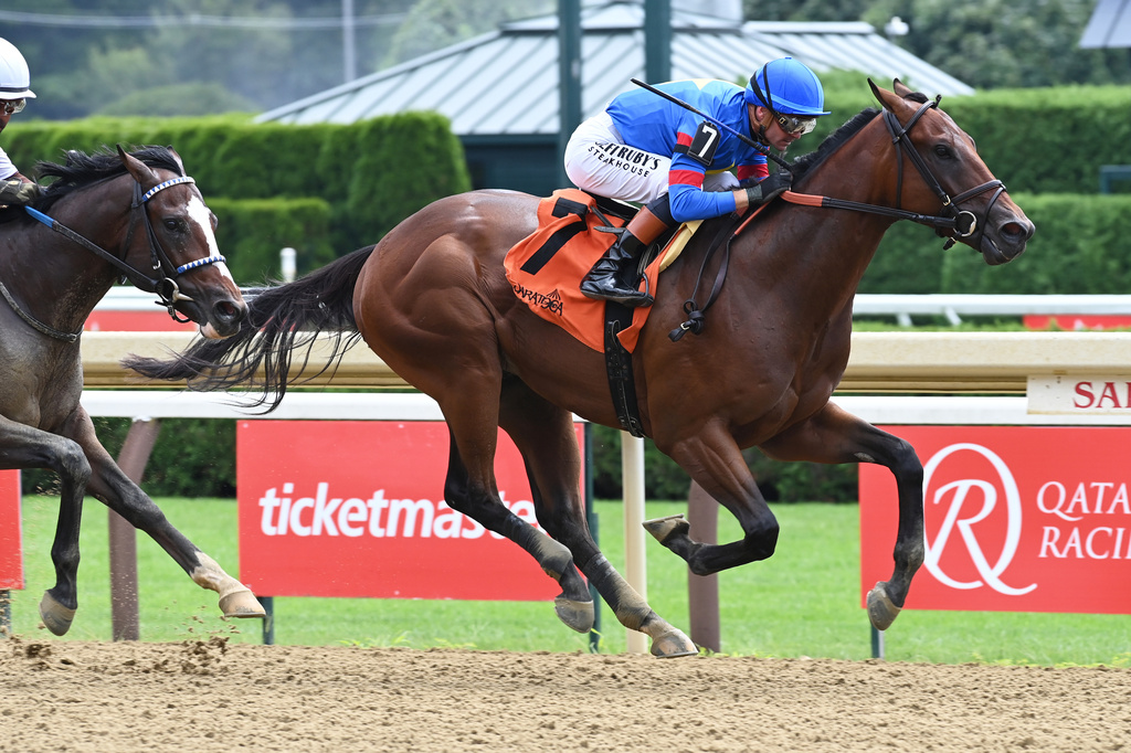 In this photo provided by the New York Racing Association, Gaudreau, a horse named after late NHL player Johnny Gaudreau, wins his first race, with jockey Flavien Prat aboard, at Saratoga Race Course in Saratoga Springs, New York, on Aug. 8, 2026. (Coglianese Photos/New York Racing Association via AP)