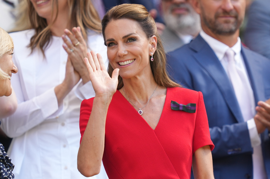 Britain's Princess Kate waves from the royal box on day 13 of the Wimbledon Tennis Championships in London, Saturday, July 11, 2026. (AP Photo/Kirsty Wigglesworth)