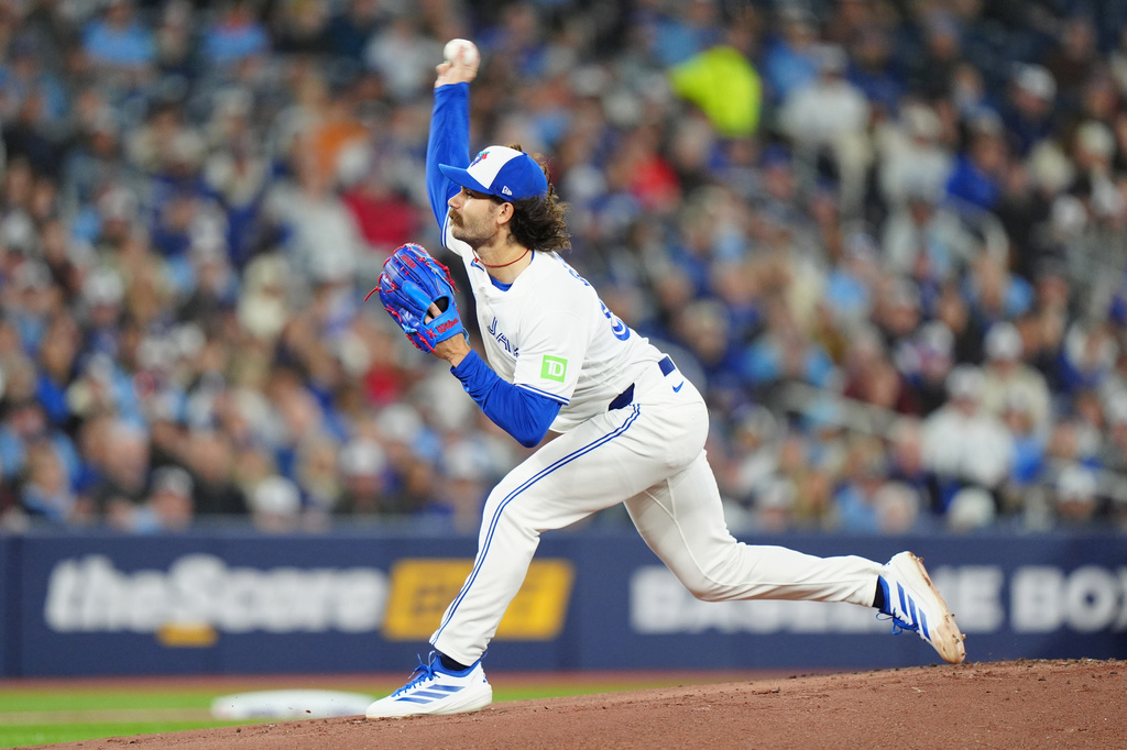 Toronto Blue Jays pitcher Dylan Cease (84) throws during the first inning of a baseball game against the Athletics in Toronto Saturday, March 28, 2026. (Frank Gunn/The Canadian Press via AP)