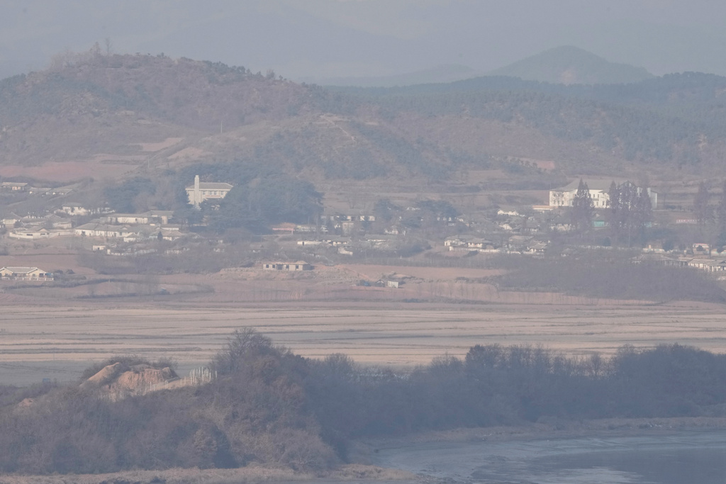 North Korea's Kaepoong town is seen from the Unification Observation Post in Paju, South Korea, Saturday, Nov. 22, 2025. (AP Photo/Ahn Young-joon)