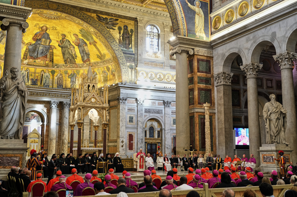 Pope Leo XIV presides over a commemoration of the martyrs and witnesses of the faith of the 21st century with representatives of other churches and Christian communions in the Basilica of St. Paul Outside the Walls in Rome, Sunday, Sept. 14, 2025. (AP Photo/Gregorio Borgia)
