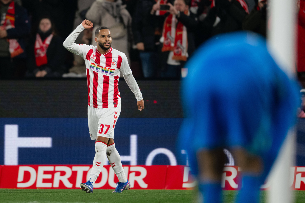 Cologne's Linton Maina celebrates after scoring during the German Bundesliga soccer match between 1. FC Cologne and VfL Wolfsburg in Cologne, Germany, Friday, Jan. 30, 2026. (Marius Becker/dpa via AP)