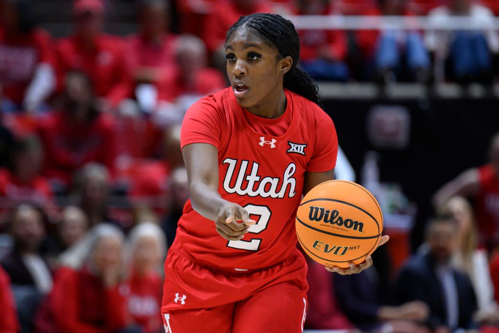 Utah guard LA Sneed directs a play during the first half of an NCAA college basketball game against TCU, Saturday, Jan. 3, 2026, in Salt Lake City. (AP Photo/Tyler Tate)
