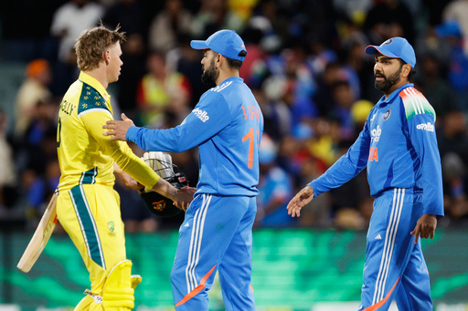Australia's Cooper Connolly, left, shakes hands with India's Virat Kohli following the one day international cricket match between Australia and India in Adelaide, Australia, Thursday, Oct. 23, 2025. (AP Photo/James Elsby) Australia's Cooper Connolly, left, shakes hands with India's Virat Kohli following the one day international cricket match between Australia and India in Adelaide, Australia, Thursday, Oct. 23, 2025. (AP Photo/James Elsby)