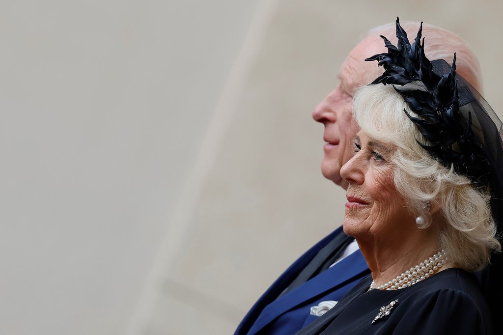 Britain's Queen Camilla arrives with King Charles III in the St. Damasus Courtyard at the Vatican for a state visit, where they will meet with Pope Leo XIV and pray with him in the Sistine Chapel, Thursday, Oct. 23, 2025. (Cecilia Fabiano/LaPresse via AP)