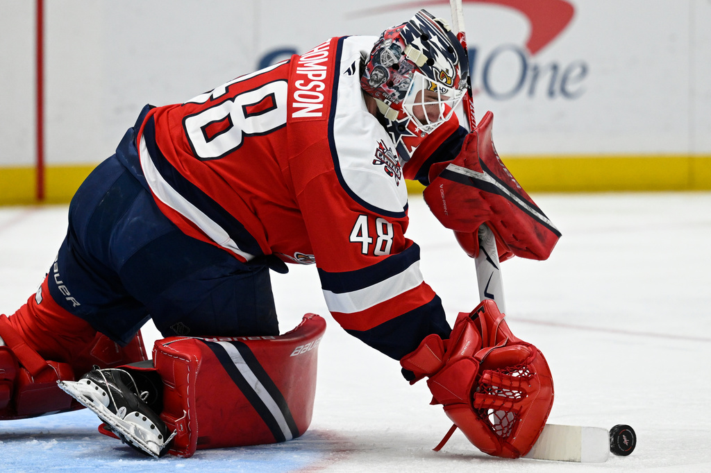 Washington Capitals goaltender Logan Thompson makes a save during the second period of an NHL Hockey game against the Buffalo Sabres, Saturday, April 4, 2026, in Washington. (AP Photo/John McDonnell)
