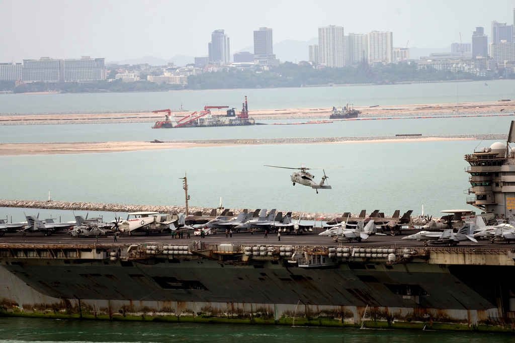 A helicopter lands on the U.S. Navy aircraft carrier USS Abraham Lincoln after it arrived at the port in Laem Chabang, Chonburi, Thailand, Wednesday, Sept. 2, 2026. (AP Photo/Sakchai Lalit)